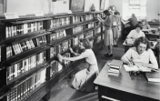 women in the 60s in a library at university